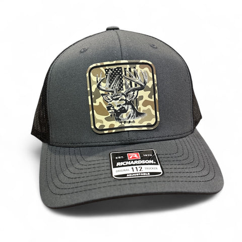 Whitetail Buck with American Flag Square Duck Camo Premium Leatherette Hat